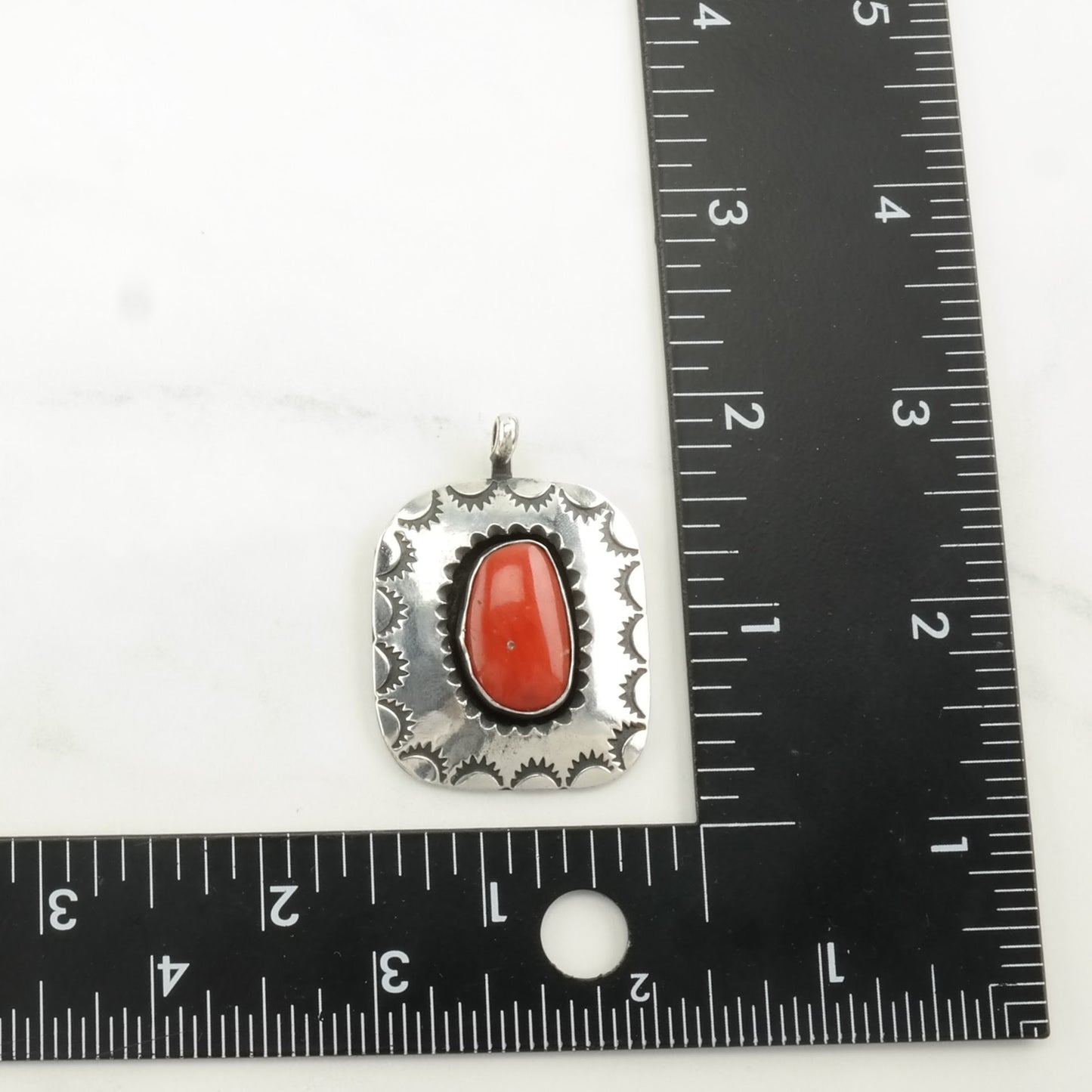 Vintage Native American Coral Stamped Sterling Silver Pendant