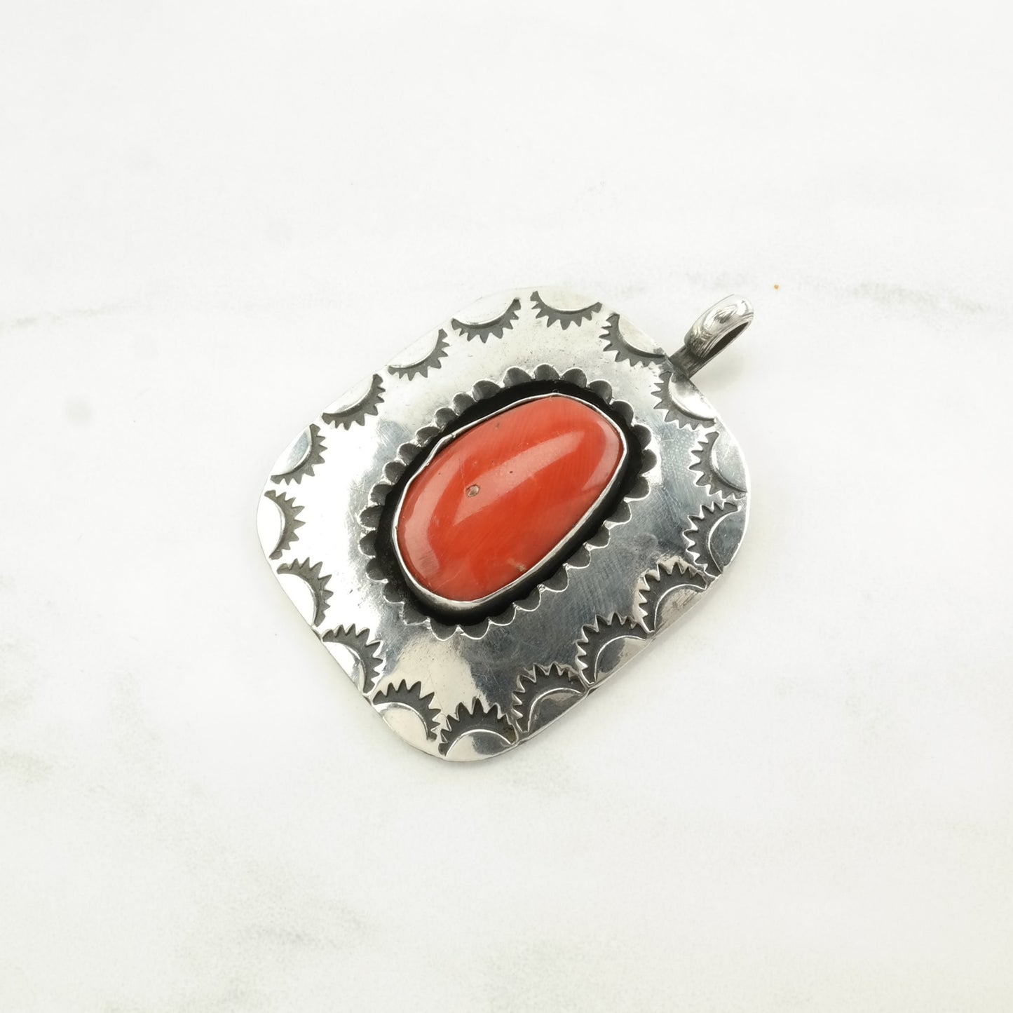 Vintage Native American Coral Stamped Sterling Silver Pendant