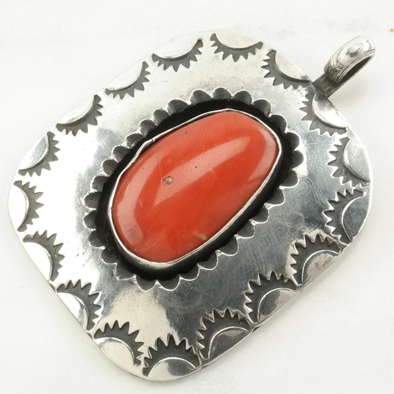 Vintage Native American Coral Stamped Sterling Silver Pendant