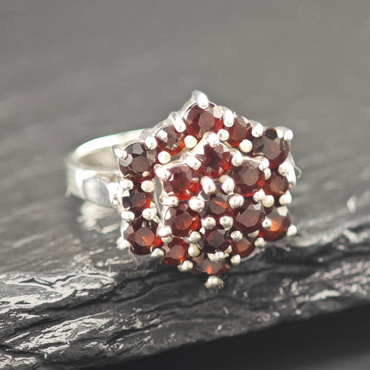 CNA Garnet Floral Ring Sterling Silver