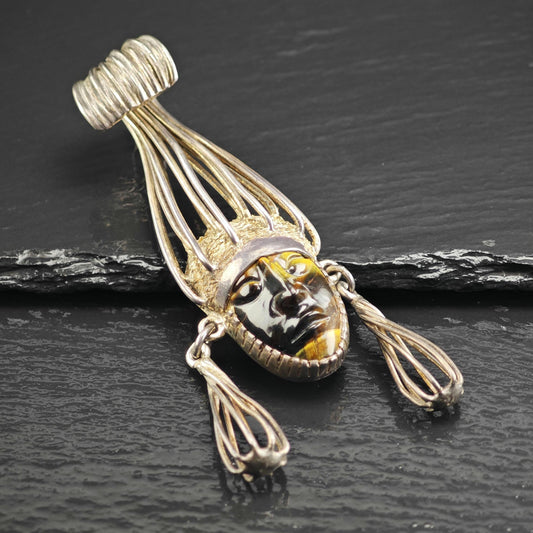 Taxco carved Tiger's Eye Aztec Warrior Pendant, Sterling Silver