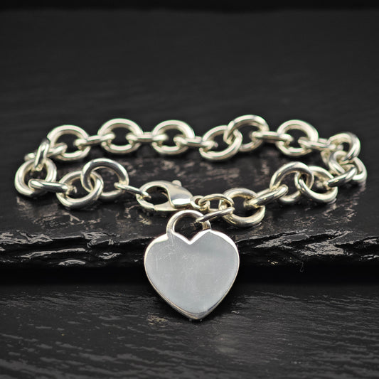 Tiffany Heart charm curb bracelet with a heart-shaped charm