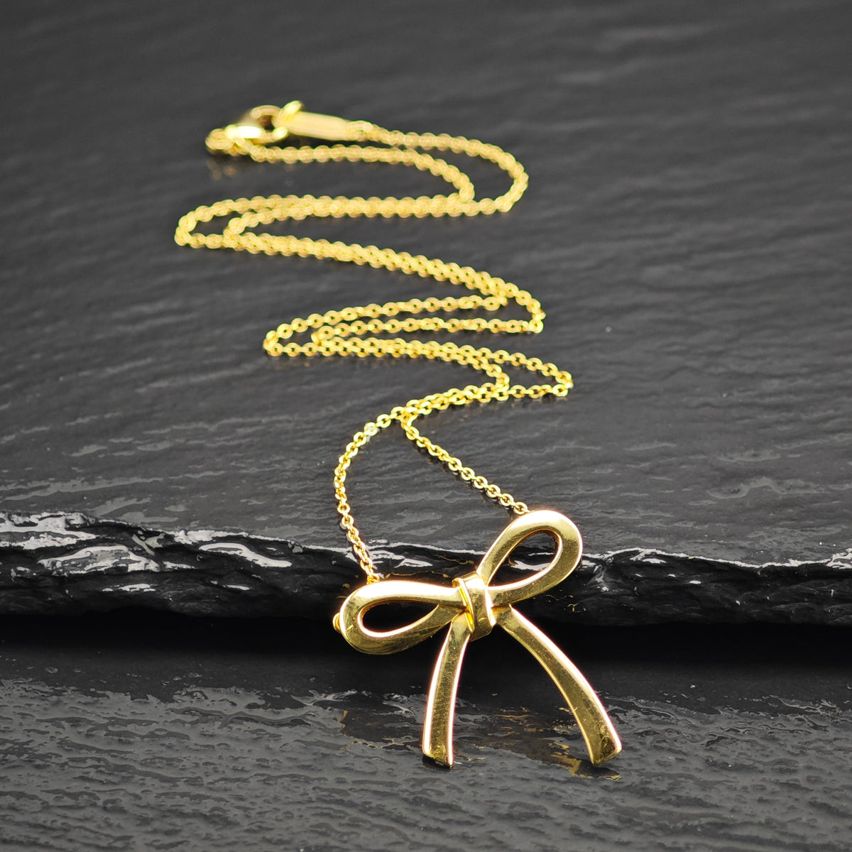 Vintage Tiffany & Co.  Sterling Silver Gold 23mm 18k Gold Bow Necklace N2780